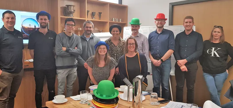 Airwork leadership programme participants in coloured hats