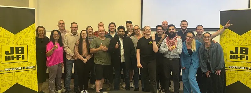 JB Hi-Fi store managers in a training room